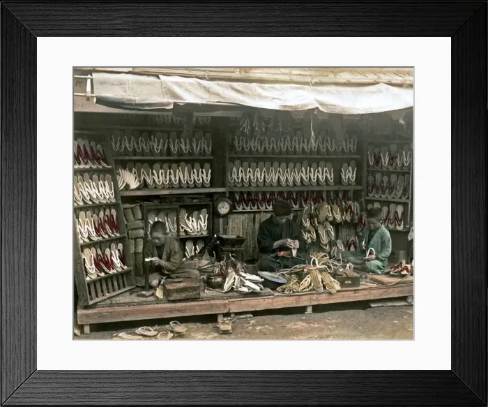 Framed Print : Boys working at a sandal store, Japan Framed Print : Boys working at a sandal store, Japan