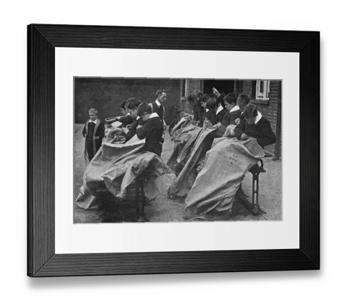 Framed Print : Children making mail bags for sending parcels to the front Framed Print : Children making mail bags for sending parcels to the front