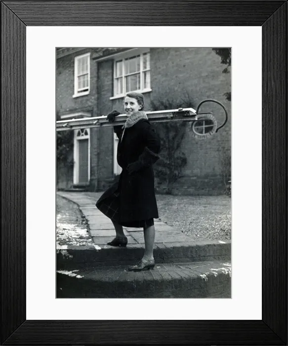 Framed Print : Rene Fraser at Buntingford carrying a climbing ladder Framed Print : Rene Fraser at Buntingford carrying a climbing ladder