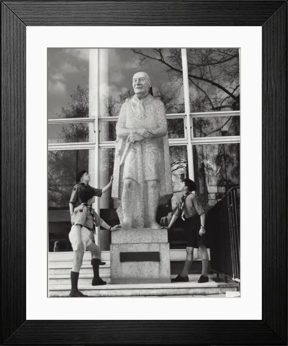 Framed Print : Boys with statue outside Baden Powell House, London Framed Print : Boys with statue outside Baden Powell House, London
