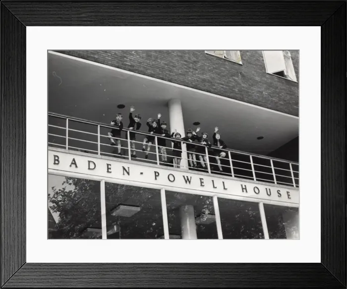 Framed Print : Cubs waving from Baden Powell House, London Framed Print : Cubs waving from Baden Powell House, London