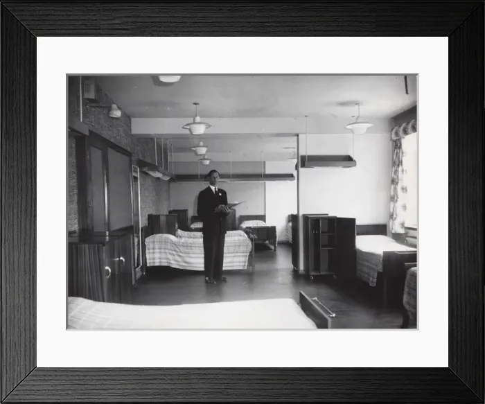Framed Print : Checking a dormitory at Baden Powell House, London Framed Print : Checking a dormitory at Baden Powell House, London