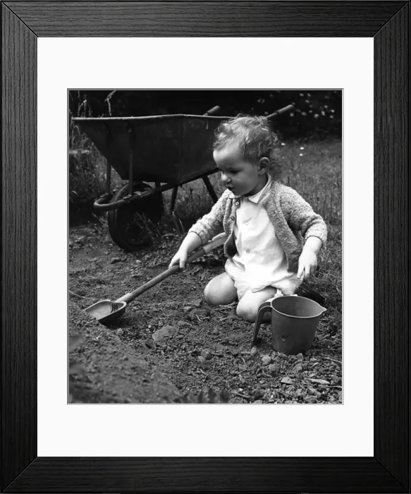 Framed Print : Toddler playing in garden Framed Print : Toddler playing in garden