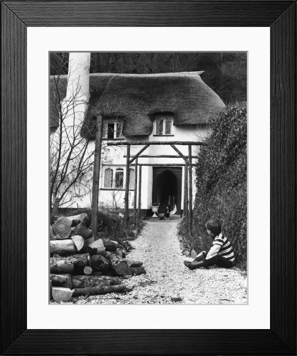 Framed Print : Boy and dog, Selworthy, Somerset