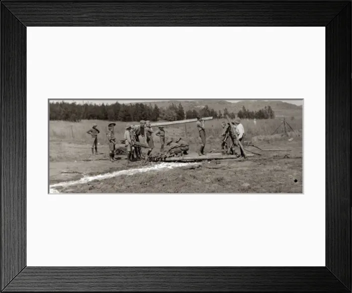 Framed Print : Boy scouts bridging a stream, South Africa Framed Print : Boy scouts bridging a stream, South Africa