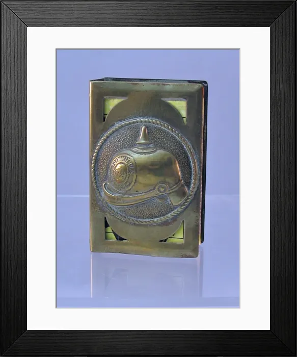 Framed Print : Matchbox cover with German helmet, WW1 Framed Print : Matchbox cover with German helmet, WW1