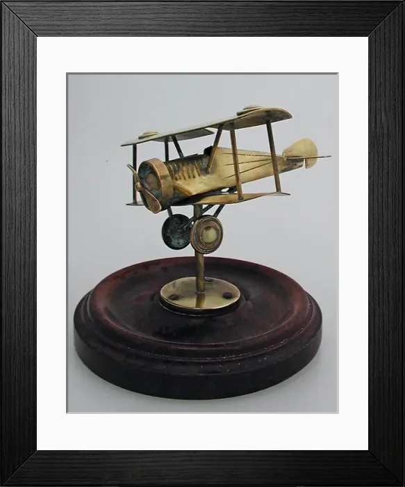 Framed Print : WW1 metal biplane on a wooden base Framed Print : WW1 metal biplane on a wooden base
