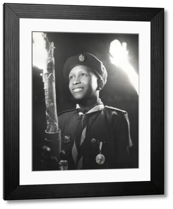 Framed Print : Boy of 3rd Bahamas Scout Troop in torchlight parade Framed Print : Boy of 3rd Bahamas Scout Troop in torchlight parade