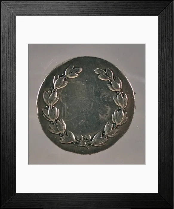 Framed Print : Silver award medal made into a brooch Framed Print : Silver award medal made into a brooch