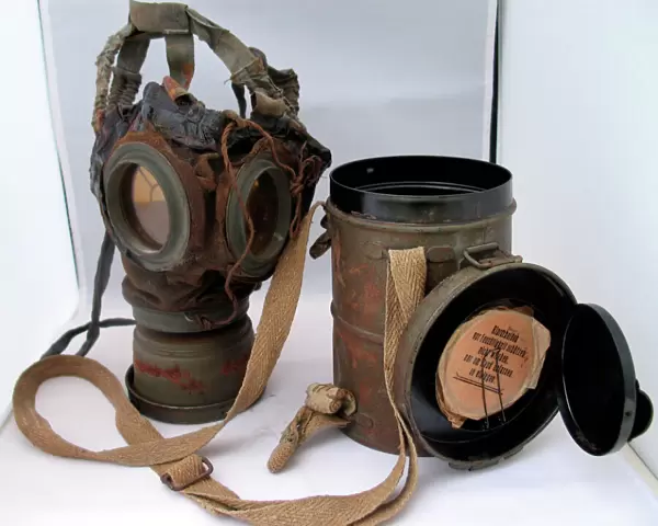 WWI German gas mask, c 1918, in its original metal containe
