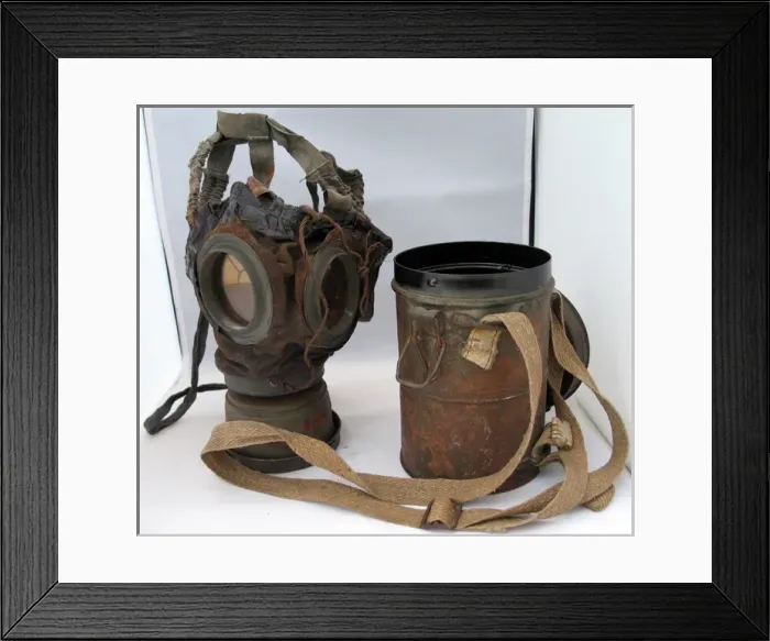 Framed Print : WWI German gas mask, c 1918, in its original metal containe Framed Print : WWI German gas mask, c 1918, in its original metal containe