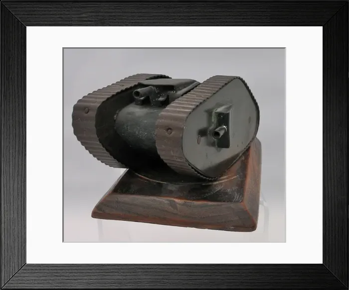 Framed Print : Metal model of WW1 tank on wooden base Framed Print : Metal model of WW1 tank on wooden base