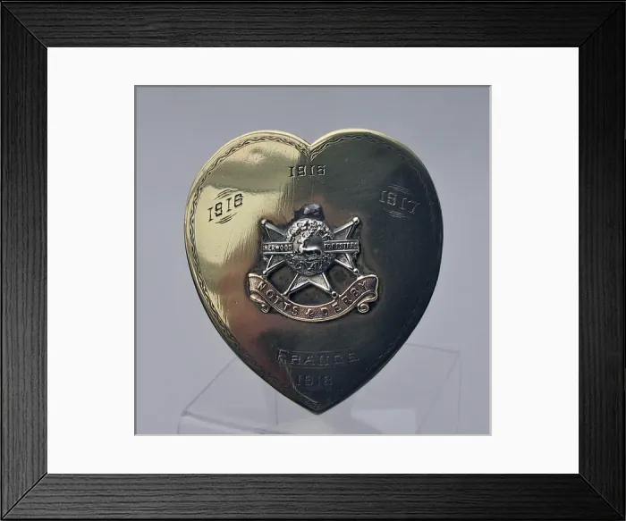 Framed Print : Brass souvenir in the form of a heart, WW1 Framed Print : Brass souvenir in the form of a heart, WW1