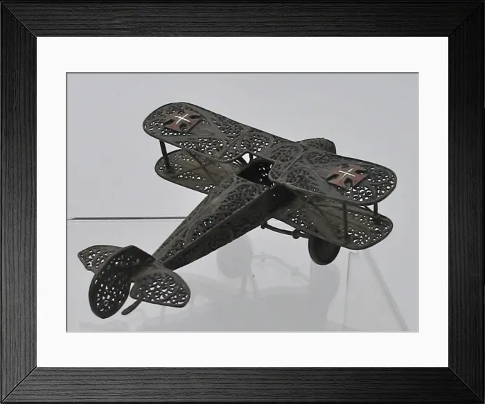 Framed Print : Model of biplane, finely cut wings and fuselage, WW1 Framed Print : Model of biplane, finely cut wings and fuselage, WW1
