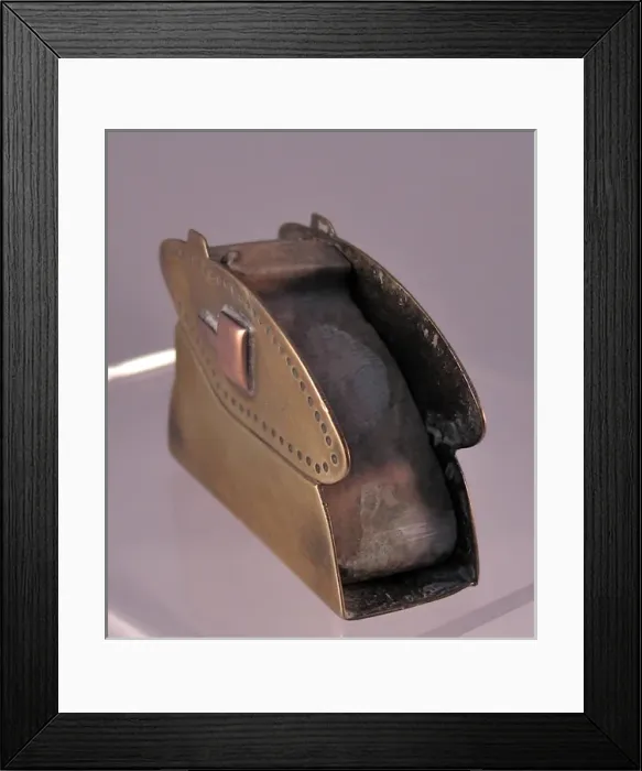 Framed Print : Match striker in the form of a WWI tank Framed Print : Match striker in the form of a WWI tank