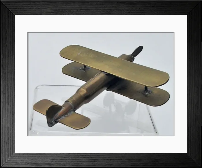 Framed Print : WWI biplane - The fuselage made from a bullet Framed Print : WWI biplane - The fuselage made from a bullet