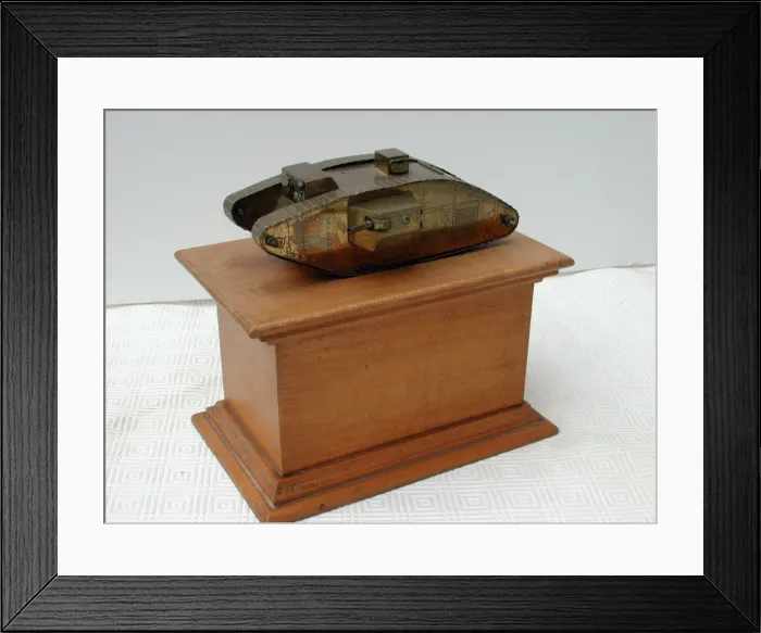 Framed Print : British tank of Great War, mounted on polished oak plinth Framed Print : British tank of Great War, mounted on polished oak plinth