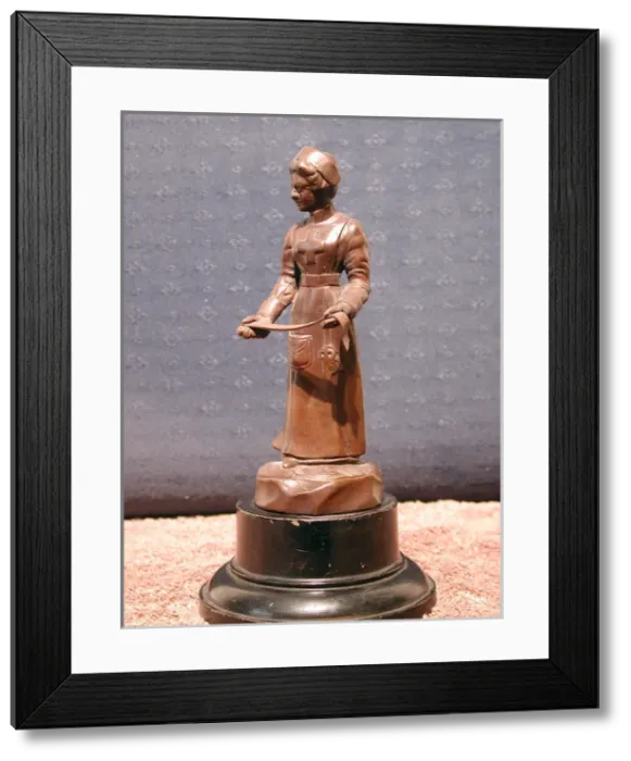 Framed Print : Statuette of a WWI nurse Framed Print : Statuette of a WWI nurse