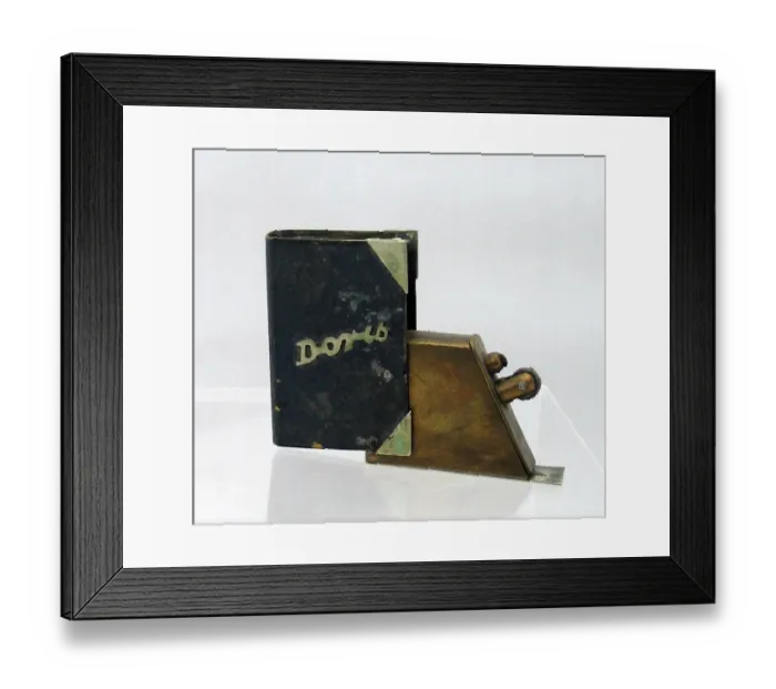 Framed Print : Trench Art lighter in the shape of a book Framed Print : Trench Art lighter in the shape of a book