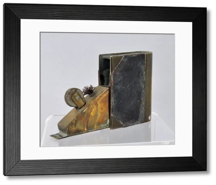 Framed Print : Trench Art lighter in the shape of a book Framed Print : Trench Art lighter in the shape of a book