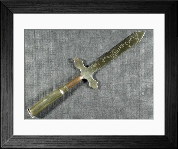 Framed Print : Letter opener Engraved with a butterfly and other objects Framed Print : Letter opener Engraved with a butterfly and other objects