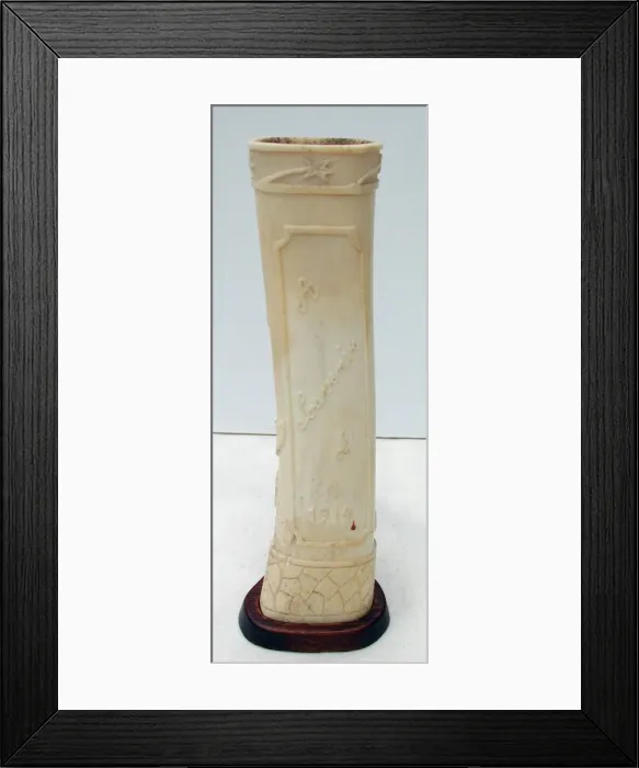 Framed Print : Pair of carved bone ornaments with raised foliate decoration Framed Print : Pair of carved bone ornaments with raised foliate decoration
