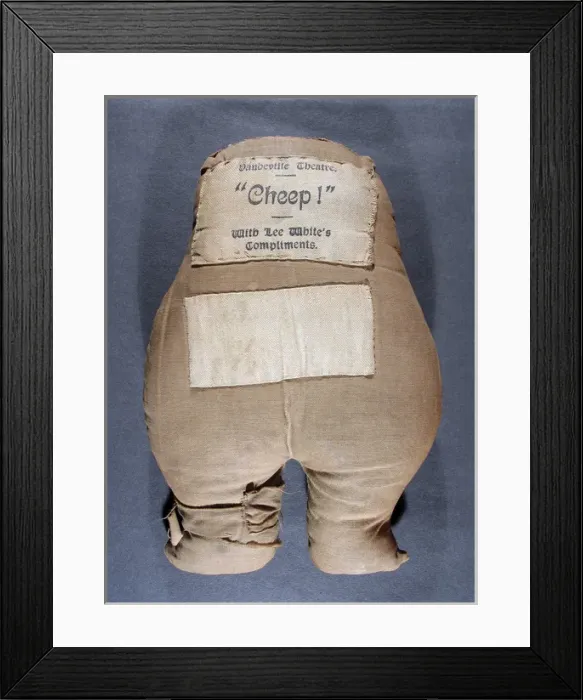 Framed Print : Ole Bill printed fabric doll with wood and button detail Framed Print : Ole Bill printed fabric doll with wood and button detail