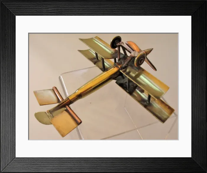 Framed Print : WWI biplane bullet fuselage with copper propeller