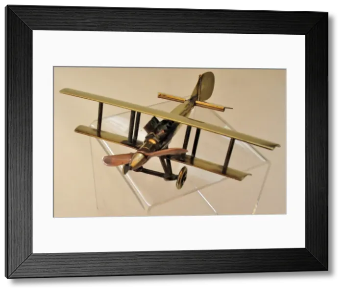 Framed Print : WWI biplane bullet fuselage with copper propeller Framed Print : WWI biplane bullet fuselage with copper propeller