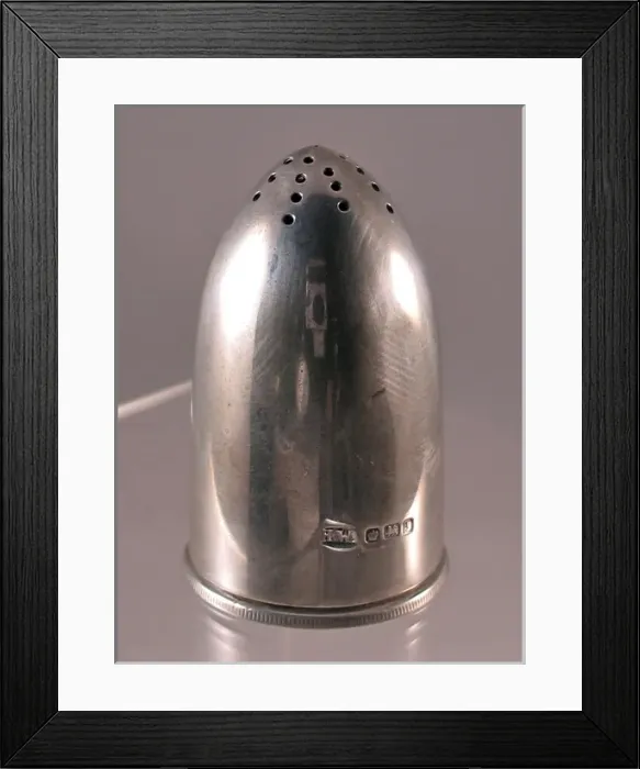 Framed Print : Silver pepper pot in the shape of a heavy Howitzer shell Framed Print : Silver pepper pot in the shape of a heavy Howitzer shell