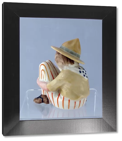Grafton china figure of a squatting American Doughboy