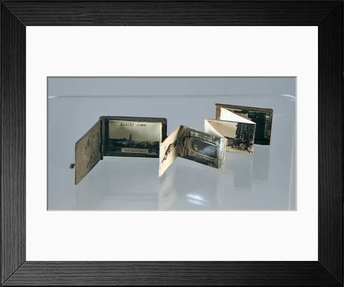 Framed Print : Metal cased album containing miniature WWI photographs Framed Print : Metal cased album containing miniature WWI photographs
