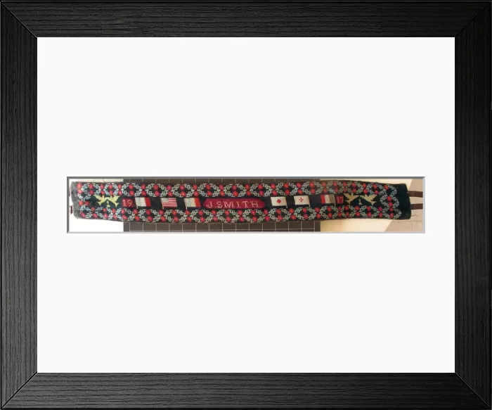 Framed Print : Handwoven belt, decorated with Allied Flags with poppies Framed Print : Handwoven belt, decorated with Allied Flags with poppies