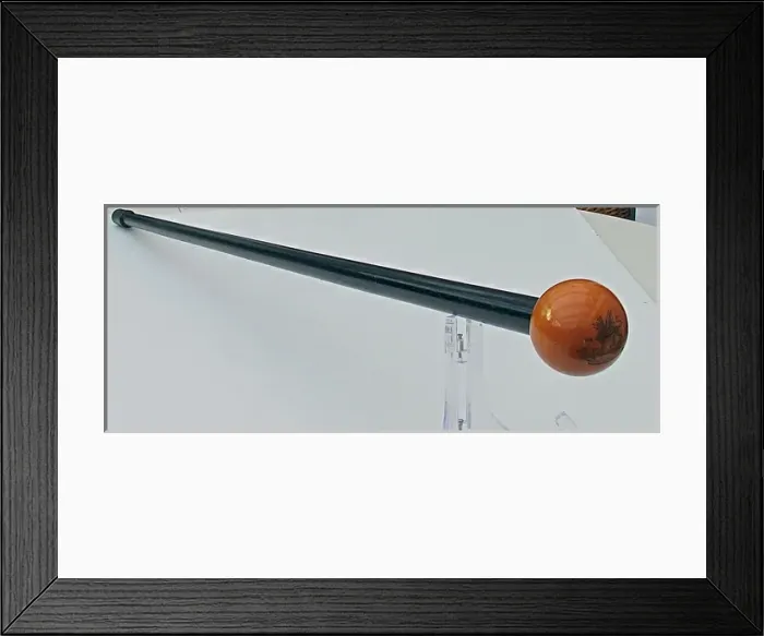 Framed Print : Black wooden stick with ivory snooker ball top Framed Print : Black wooden stick with ivory snooker ball top