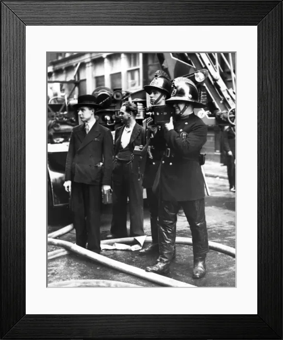 Framed Print : London Fire Brigade cinematographer at work Framed Print : London Fire Brigade cinematographer at work