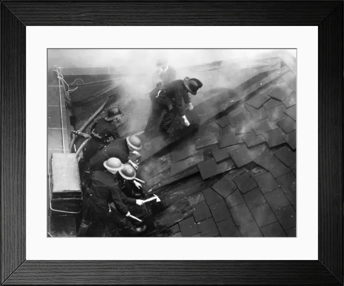 Framed Print : Firefighters cutting through a roof Framed Print : Firefighters cutting through a roof