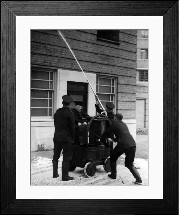 Framed Print : Firefighters operating old pump at special drill display Framed Print : Firefighters operating old pump at special drill display