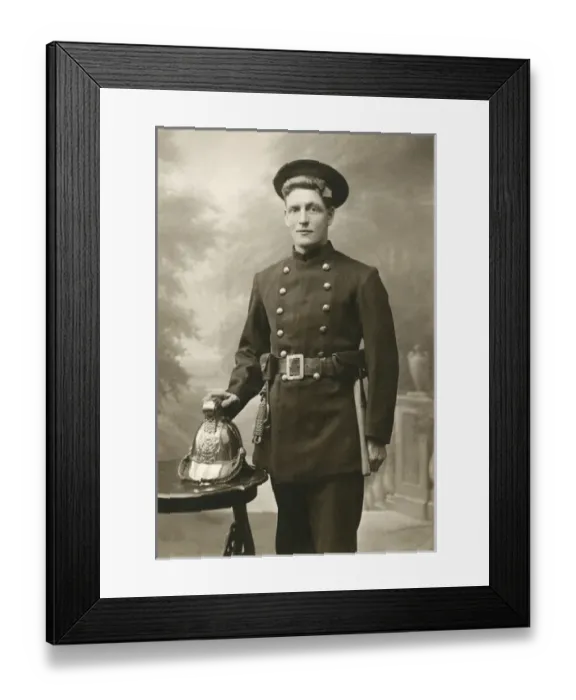 Framed Print : Young fireman in studio photograph Framed Print : Young fireman in studio photograph