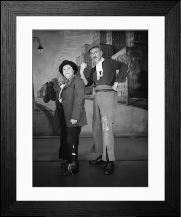 Framed Print : Man and woman performing a comic song Framed Print : Man and woman performing a comic song