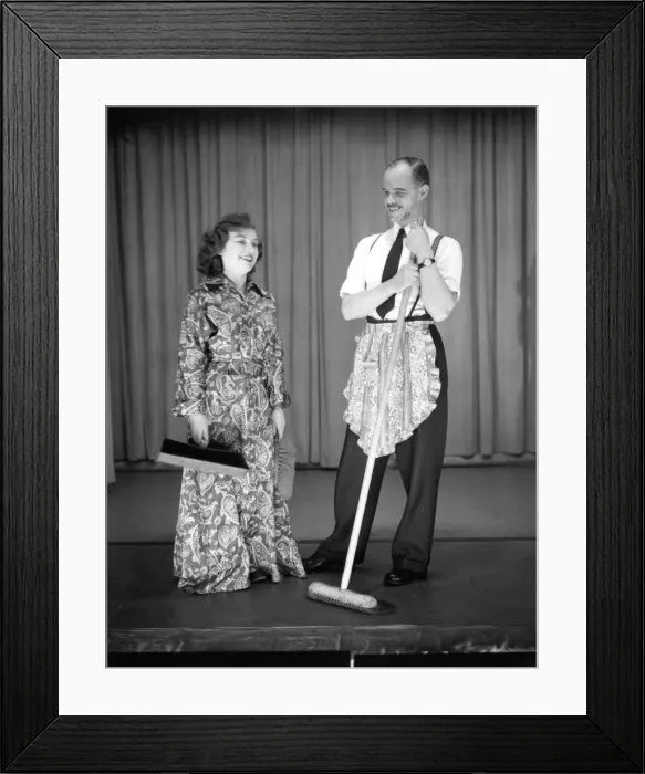Framed Print : Man and woman performing a comic sketch Framed Print : Man and woman performing a comic sketch