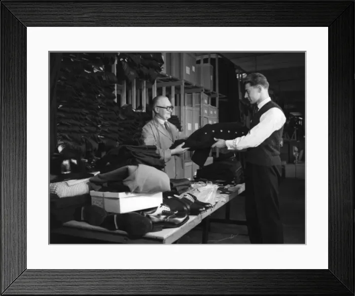 Framed Print : New LFB recruit being kitted out with uniform Framed Print : New LFB recruit being kitted out with uniform
