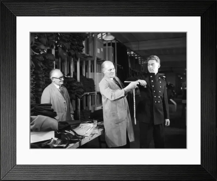 Framed Print : New LFB recruit being measured for uniform Framed Print : New LFB recruit being measured for uniform