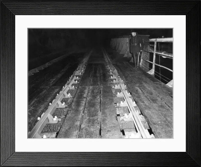Framed Print : Distorted rails after fire in Hackney, East London Framed Print : Distorted rails after fire in Hackney, East London