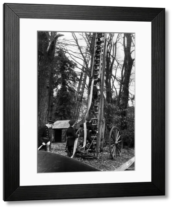 Framed Print : Junior LFB firefighters practise on a Wheeled Escape Ladder Framed Print : Junior LFB firefighters practise on a Wheeled Escape Ladder