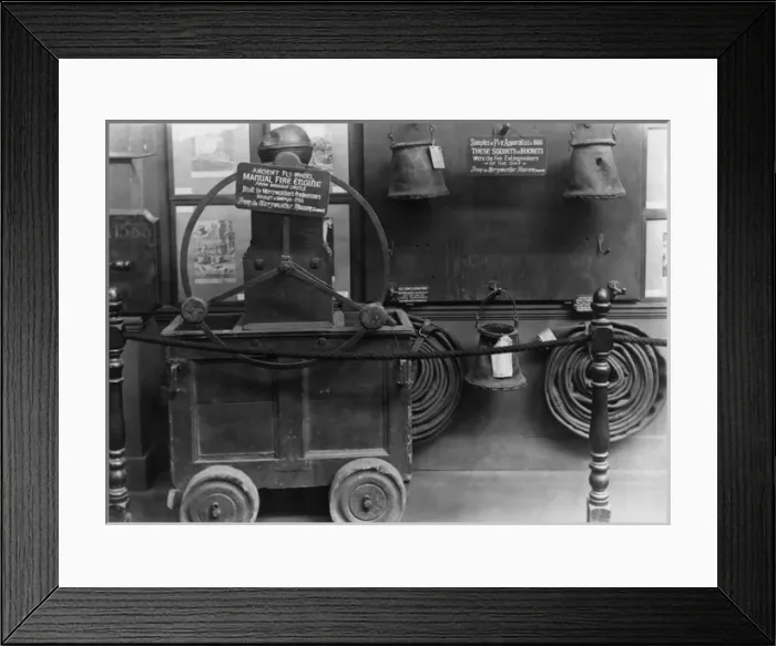 Framed Print : Old fire engine and other equipment in a museum Framed Print : Old fire engine and other equipment in a museum