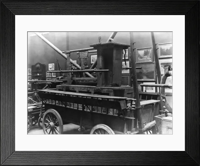 Framed Print : Old manual fire engine in a museum Framed Print : Old manual fire engine in a museum