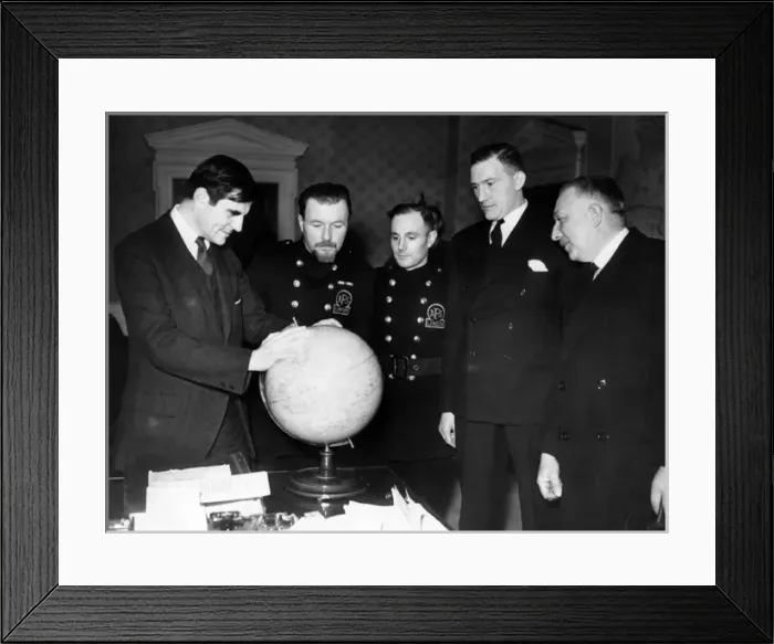 Framed Print : AFS men and others looking at a globe, WW2 Framed Print : AFS men and others looking at a globe, WW2