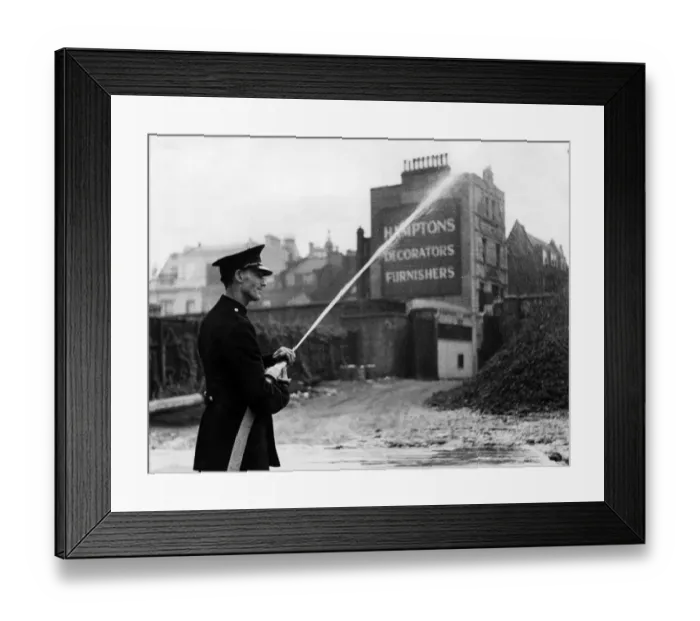 Framed Print : Firefighter in Orange Street, London W1, WW2 Framed Print : Firefighter in Orange Street, London W1, WW2