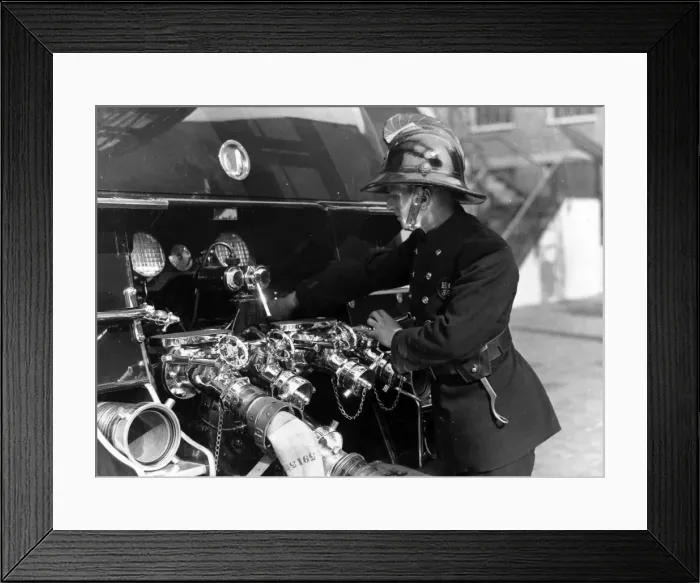 Framed Print : LFB firefighter with new motor pump Framed Print : LFB firefighter with new motor pump