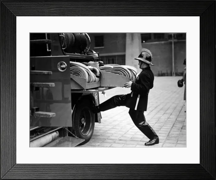 Framed Print : LFB firefighter at back of enclosed pump vehicle Framed Print : LFB firefighter at back of enclosed pump vehicle